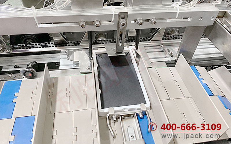 手機鋼化膜自動裝袋裝盒生產線推料機構